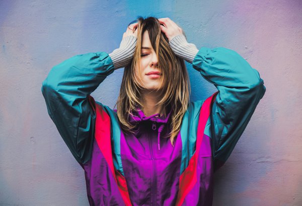 What's the Best Way to Style a Lace Camisole for a Layered Business Look?